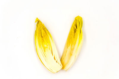 High angle view of banana against white background