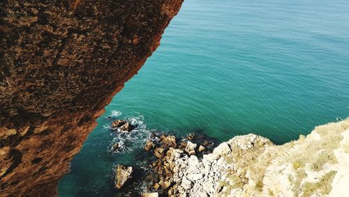 High angle view of rocks on beach