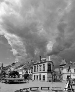 Buildings in city against sky