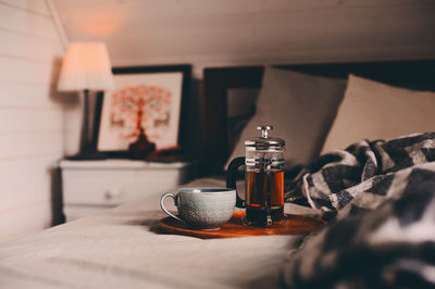 Close-up of tea cup on table at home