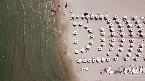 High angle view of group of people on beach