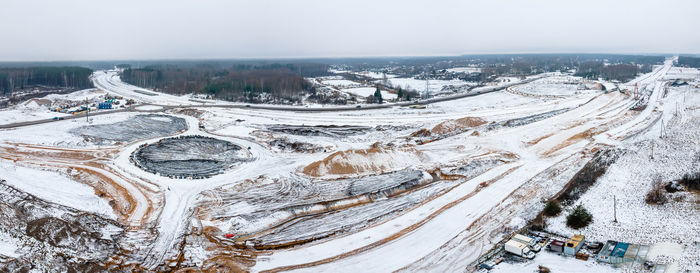 High angle view of snow covered landscape against sky