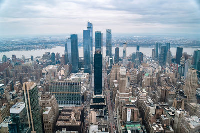 Aerial view of cityscape against sky