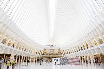 Low angle view of people in city