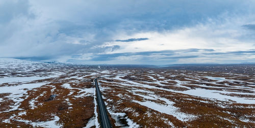 Aerial video of an empty lava fields and huge volcanic mountain in iceland