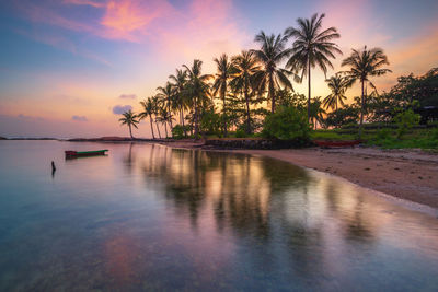 Scenic view of sea against sky at sunset