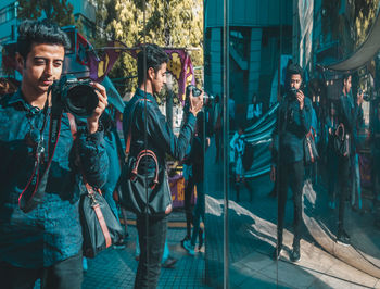 Group of people standing in a city