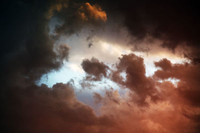 Low angle view of clouds in sky during sunset