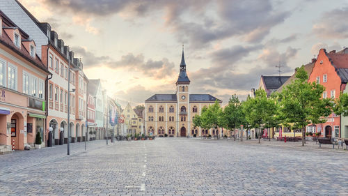 View of buildings in city against sky