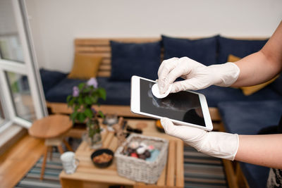 Midsection of woman working at table