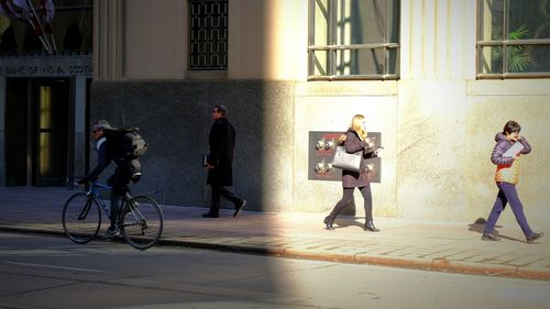 People on street in city