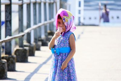 Portrait of girl eating ice cream