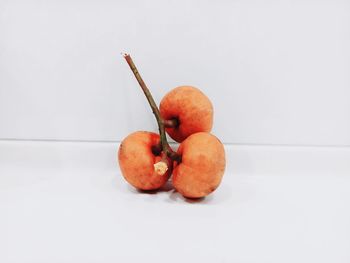 Close-up of apple against white background