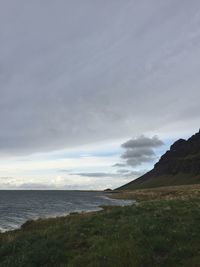 Scenic view of beach and sea against sky