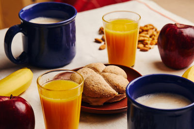 Cup of coffee and drink on table