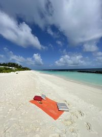 Scenic view of beach against sky