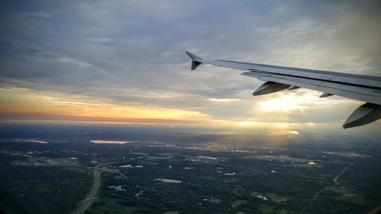 flying, airplane, cloud - sky, sunset, sky, transportation, air vehicle, no people, outdoors, technology, sea, commercial airplane, airshow, fighter plane, nature, day, aerospace industry, air force, airplane wing