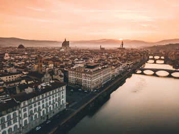 High angle view of river amidst buildings in city