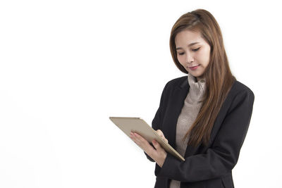 Young woman using mobile phone