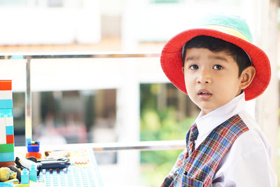 Portrait of cute boy looking away