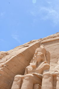 Low angle view of statue of temple against sky