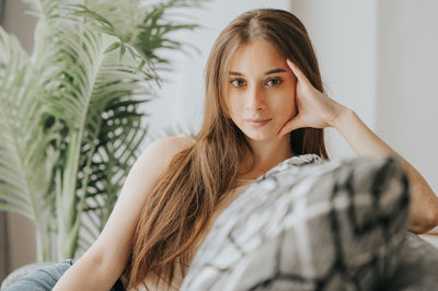 Portrait of beautiful woman at home