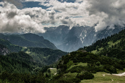 Scenic view of mountains against sky - hiking in the alps
