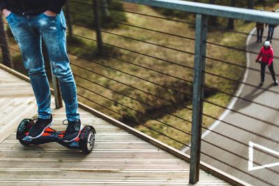 Low section of man riding bicycle