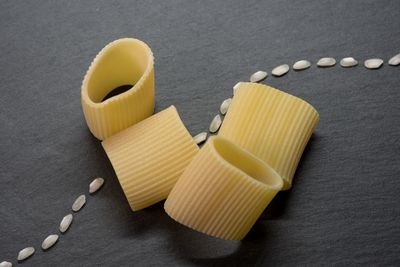 High angle view of yellow eggs on table