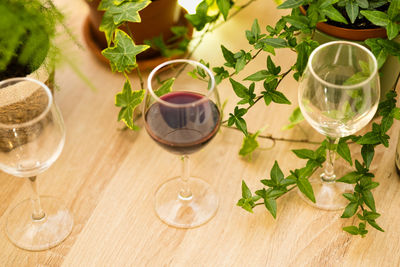 Glass of wine glasses on table