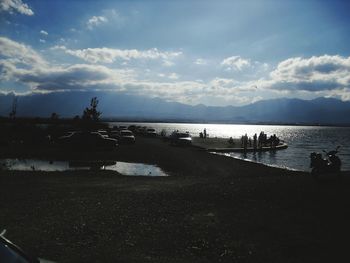 Scenic view of sea against cloudy sky