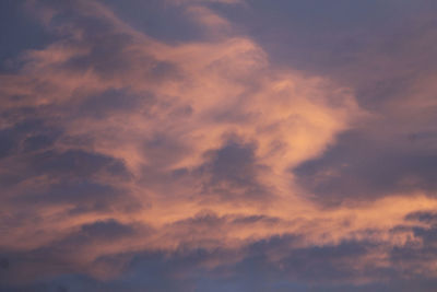 Low angle view of dramatic sky during sunset