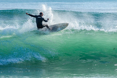 Man surfing in sea