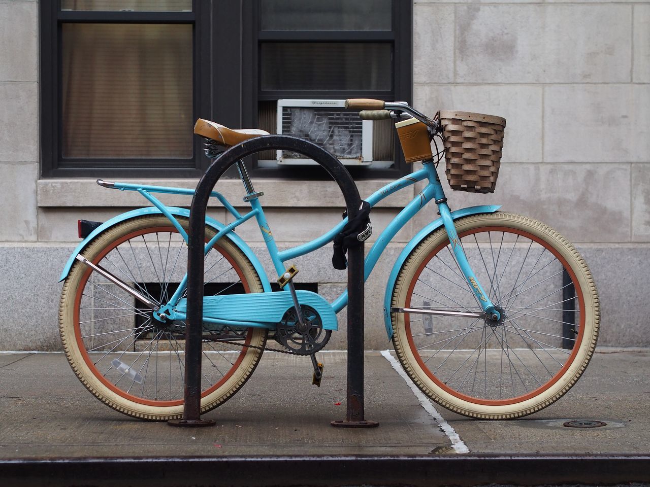 bicycle, built structure, architecture, building exterior, stationary, parking, parked, wall - building feature, transportation, wall, mode of transport, window, land vehicle, absence, no people, day, house, sidewalk, door, building