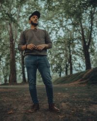 Full length of man standing on field