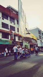 People on street in city