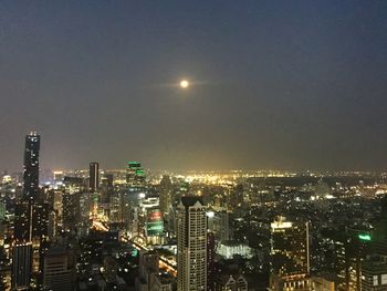 Illuminated cityscape at night