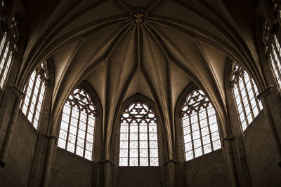 Low angle view of glass window in building