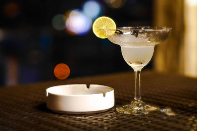 Close-up of wine glass on table in restaurant