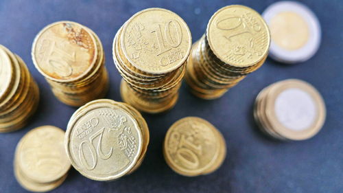 High angle view of coins on table