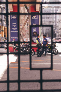 Man riding bicycle on city