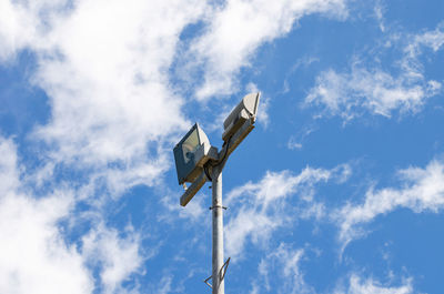 Low angle view of airplane against sky