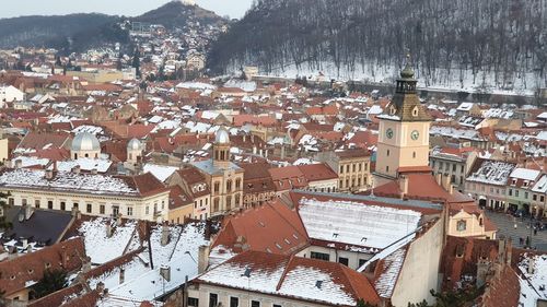 High angle view of houses in town during winter