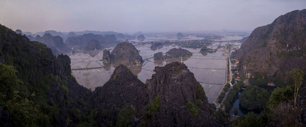 High angle view of landscape with mountain range in background