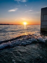 Scenic view of sea against sky during sunset