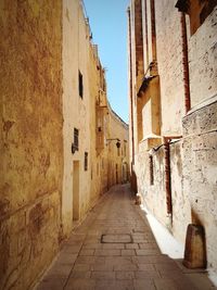 Narrow alley along buildings