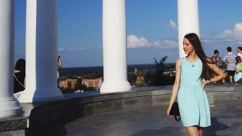 Woman standing in balcony