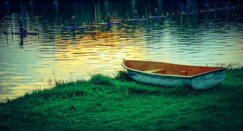 Boat moored at lakeshore