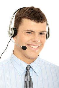 Portrait of smiling young man using mobile phone