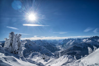 Scenic view of snowcapped mountains against sky